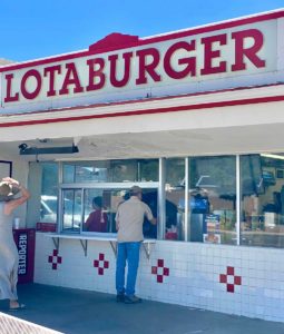 Exterior of Blake's Lotaburger with client ordering.