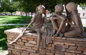 Sculpture entitled "The Facts of Life" outside the Carlsbad Museum.