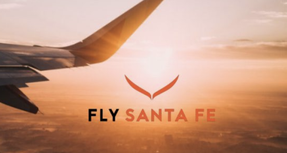 Fly Santa Fe logo, sky, and jet.