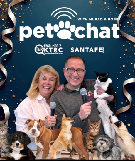 Two hosts holding microphones with cats and dogs around them on a blue festive Pet Chat banner to promote the show with pets.