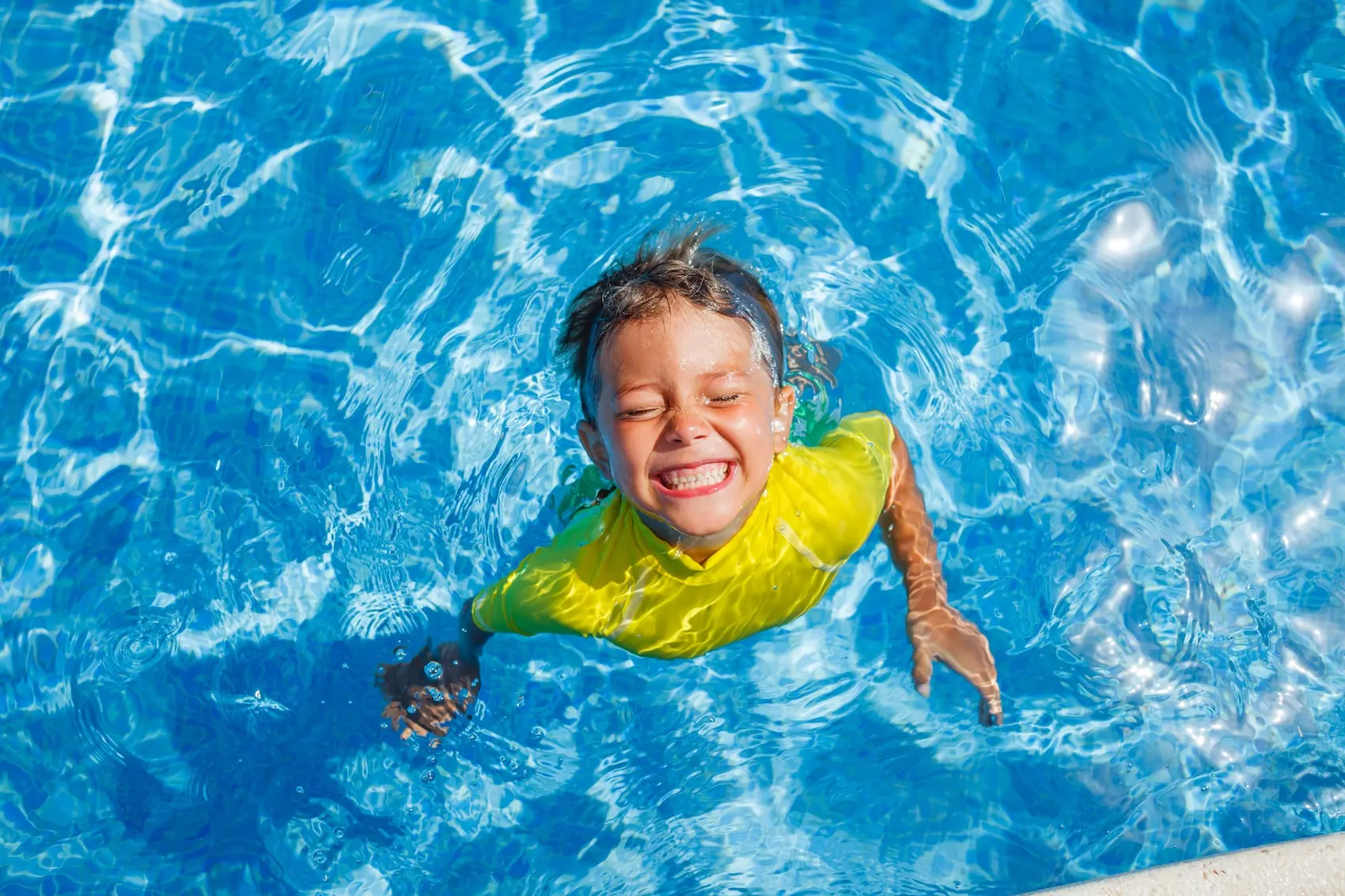 Boy in Santa Fe city pool.